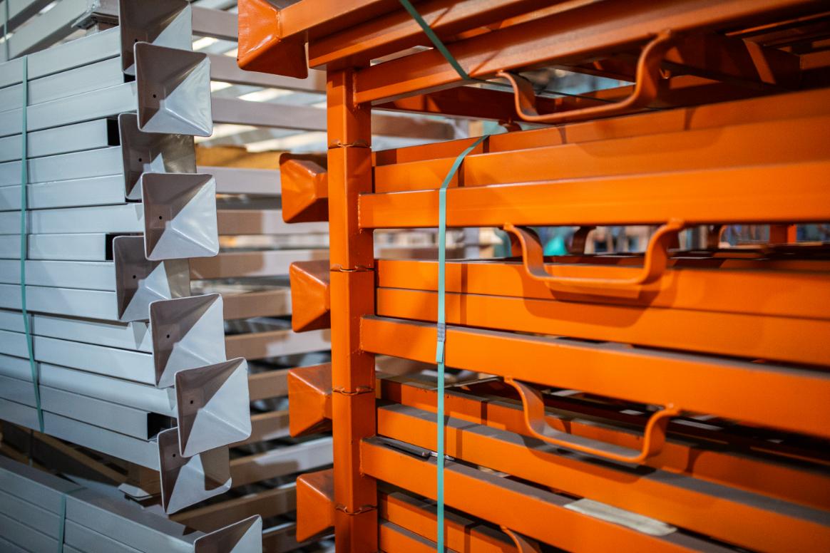 Orange steel racks stacked
