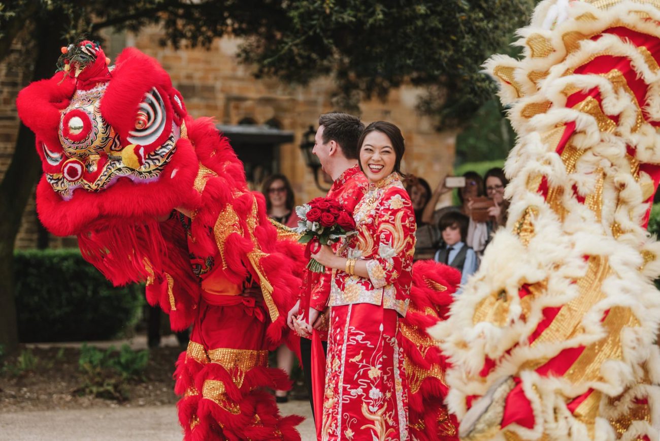 chinese bride and groom walking at a wedding ceremony