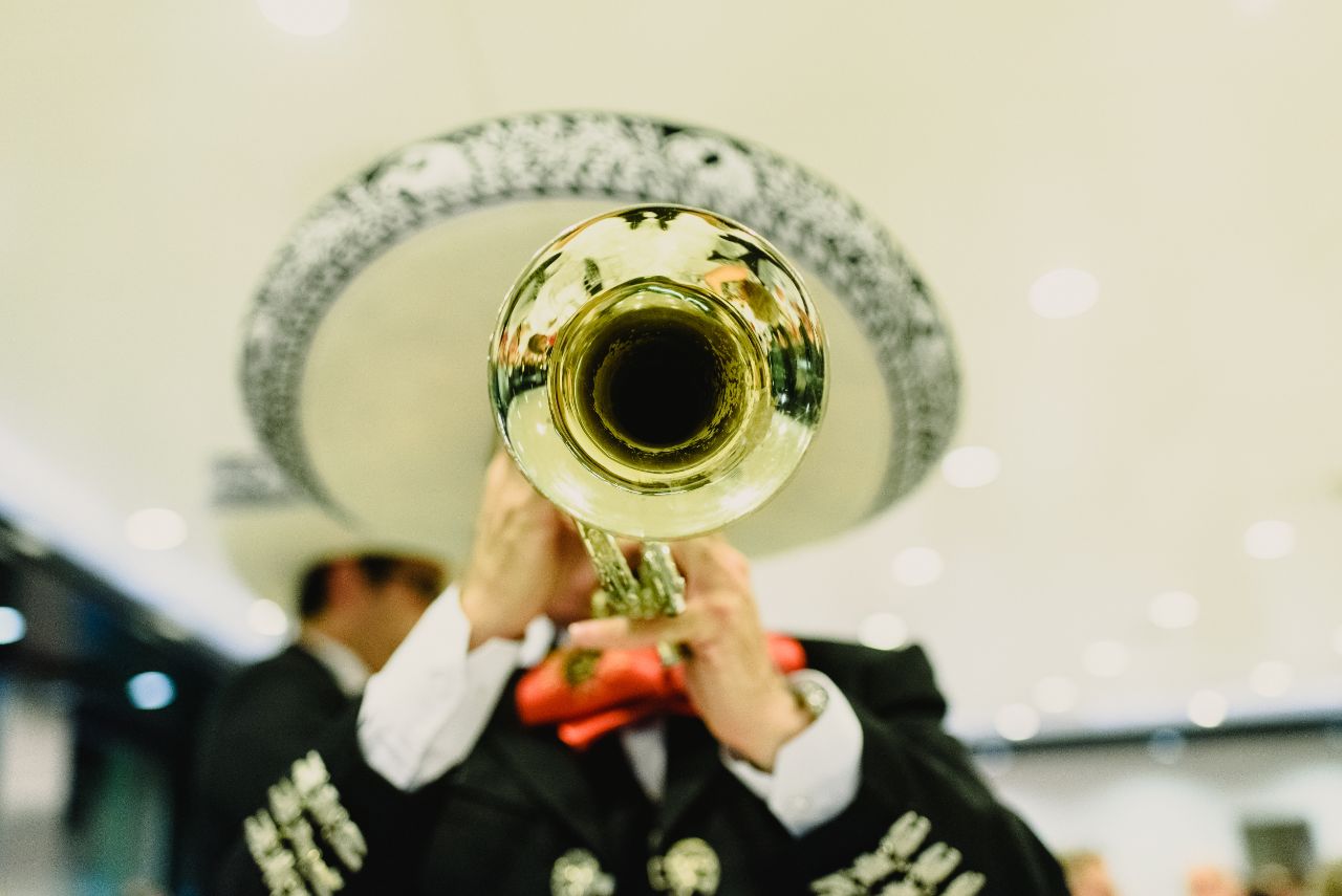mexican musician holding a trumpet