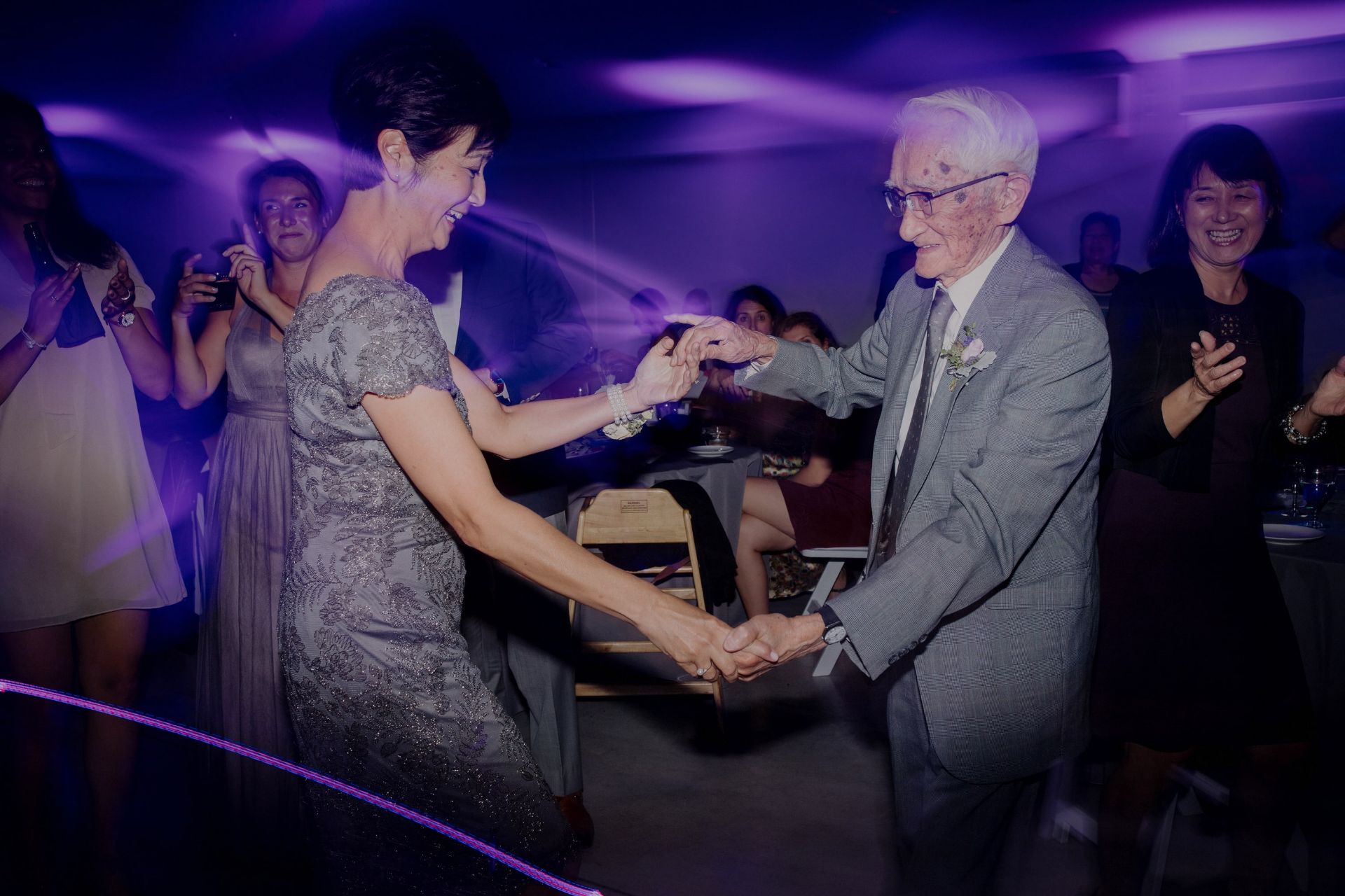 grandma and grandpa dancing at a wedding
