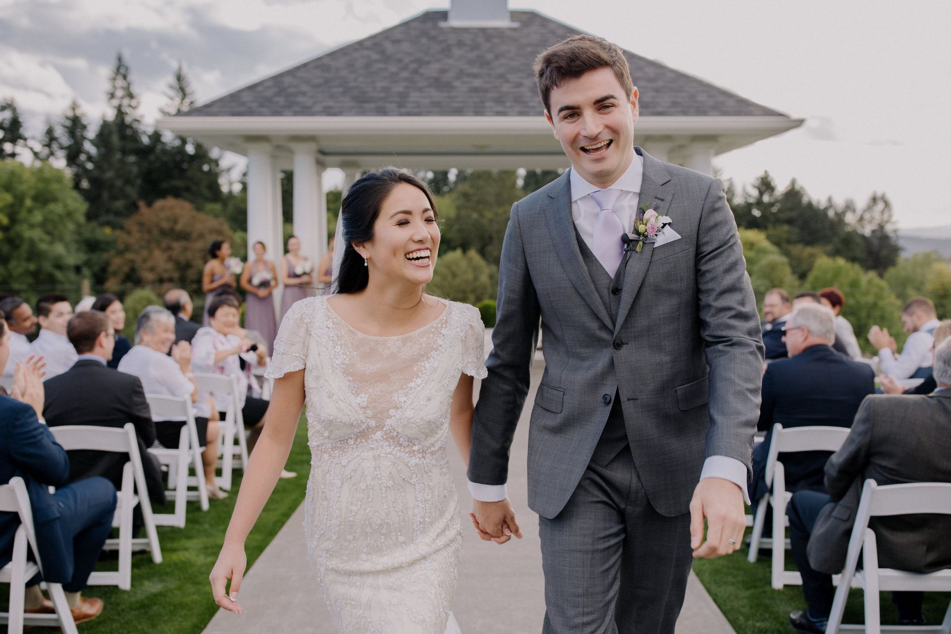 bride and groom walking down the aisle exiting