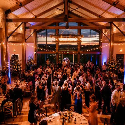 The Aerie at Eagle Landing Oregon wedding reception with warm event lighting active dance floor and elevated peaceful venue atmosphere at evening 