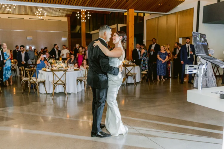 Bride and groom sharing their first dance during an Amaterra Winery wedding reception in Portland, Oregon.