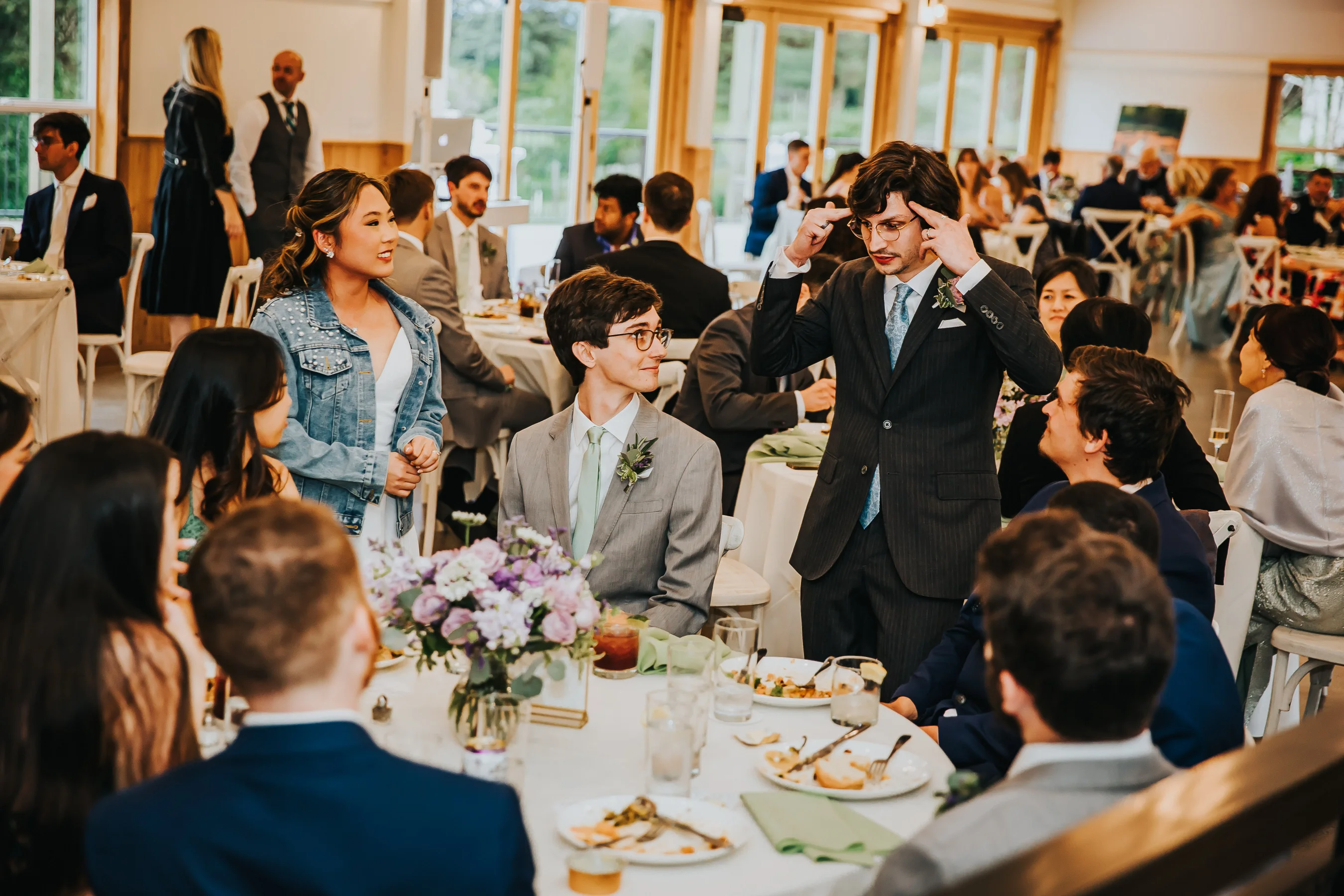 Groom giving a speech to guests during an Aurora Vineyards wedding reception in Oregon.