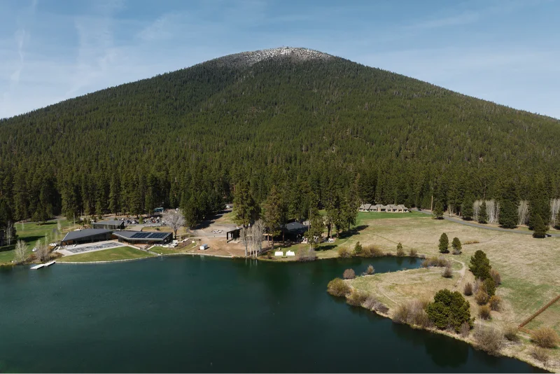 Aerial view of Black Butte Ranch wedding venue with mountain, lake, and forest in Central Oregon.