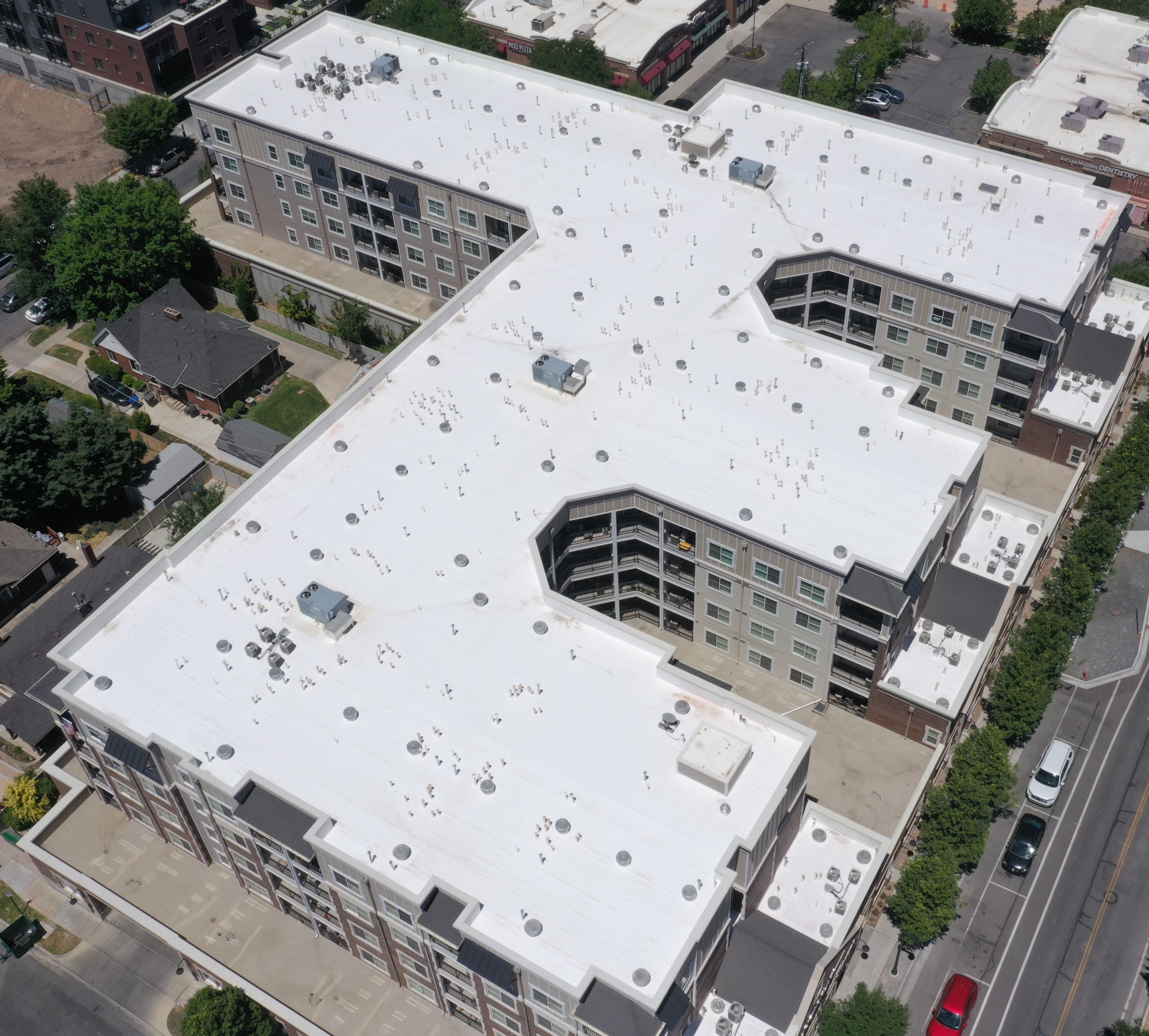 Aerial view of a completed Apex commercial roof replacement