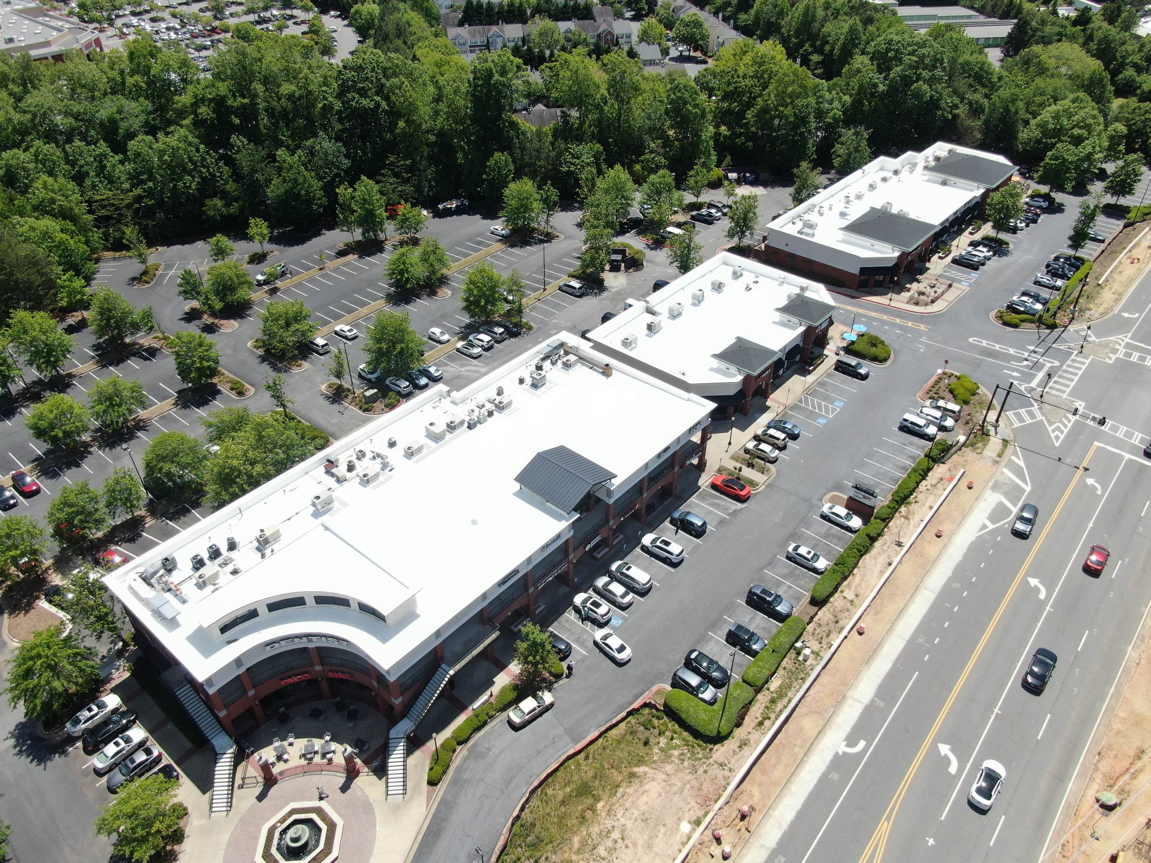 Aerial view of a completed Apex commercial roof replacement