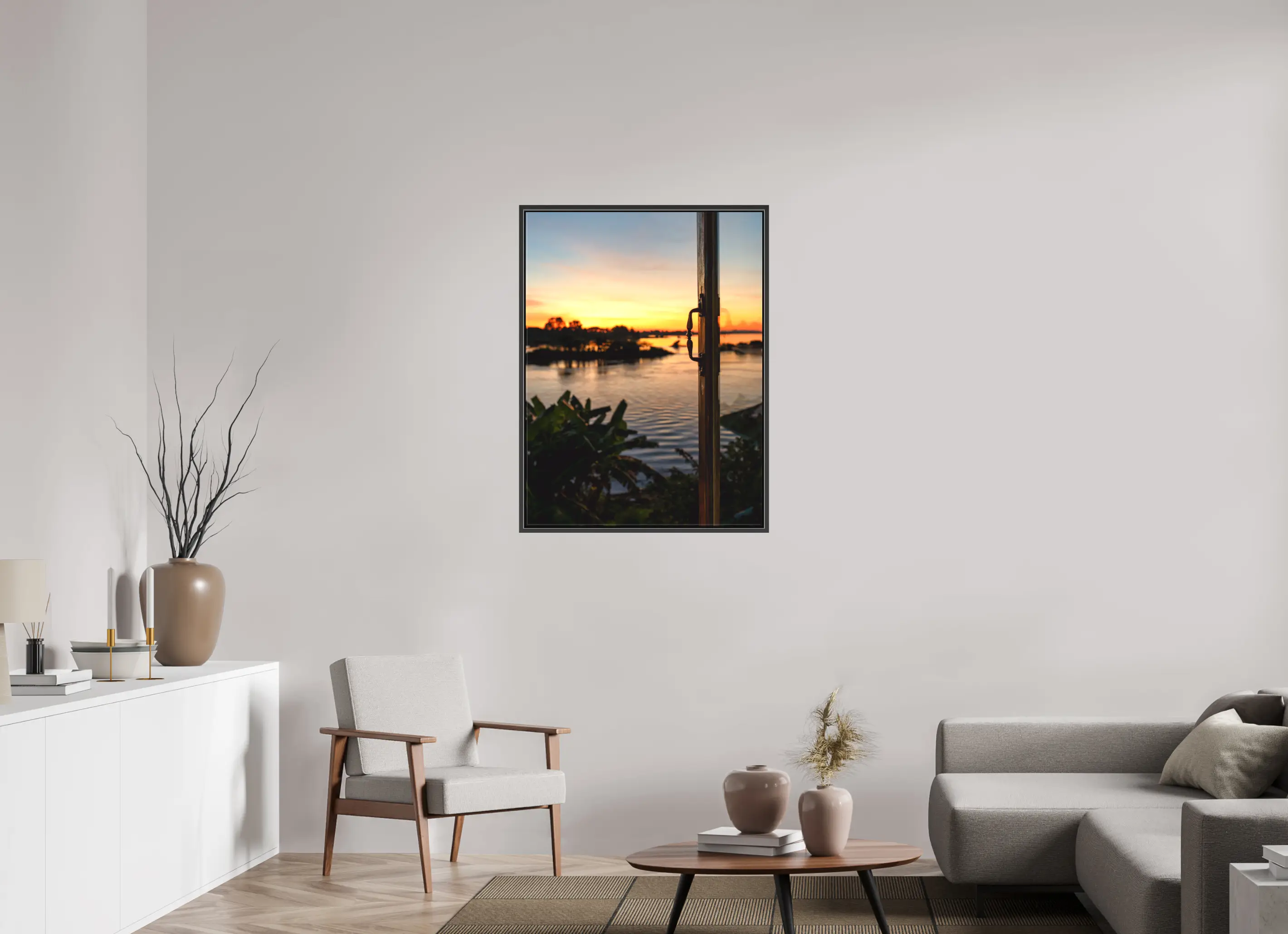 Fine art print “Twilight” featuring sunset over the Mekong River with warm orange and gold hues, displayed on a premium framed canvas print in a modern living room setting.