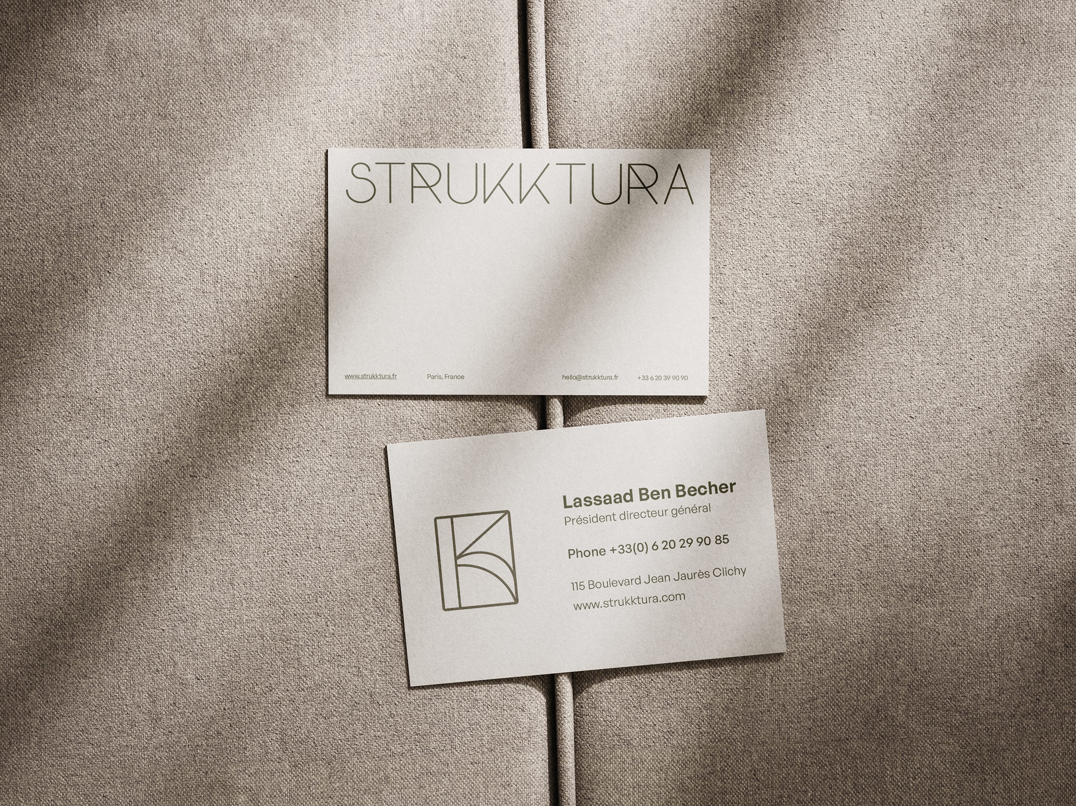 Business card with a modern design and contact information