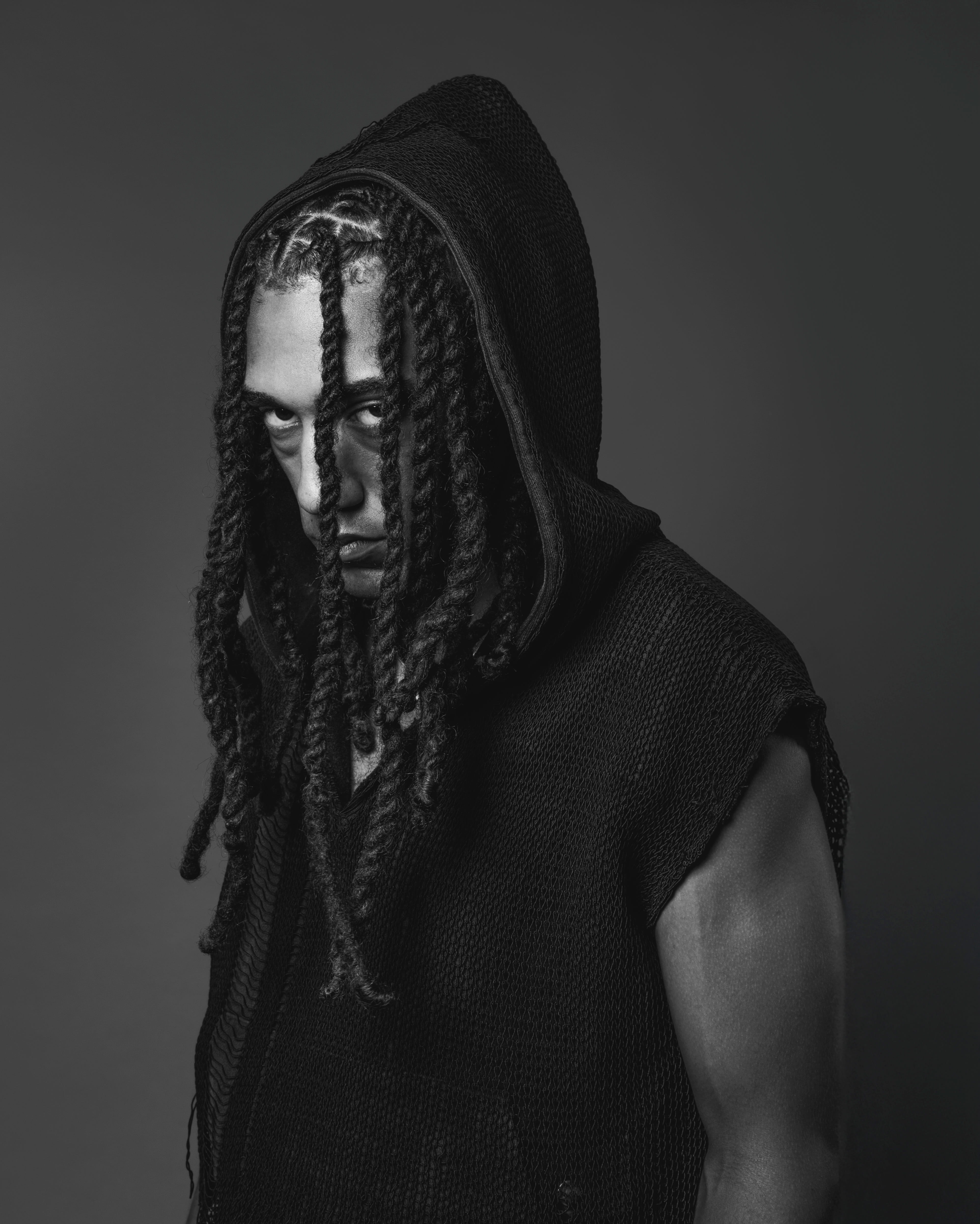 Moody studio portrait example showing dramatic lighting for client photoshoot