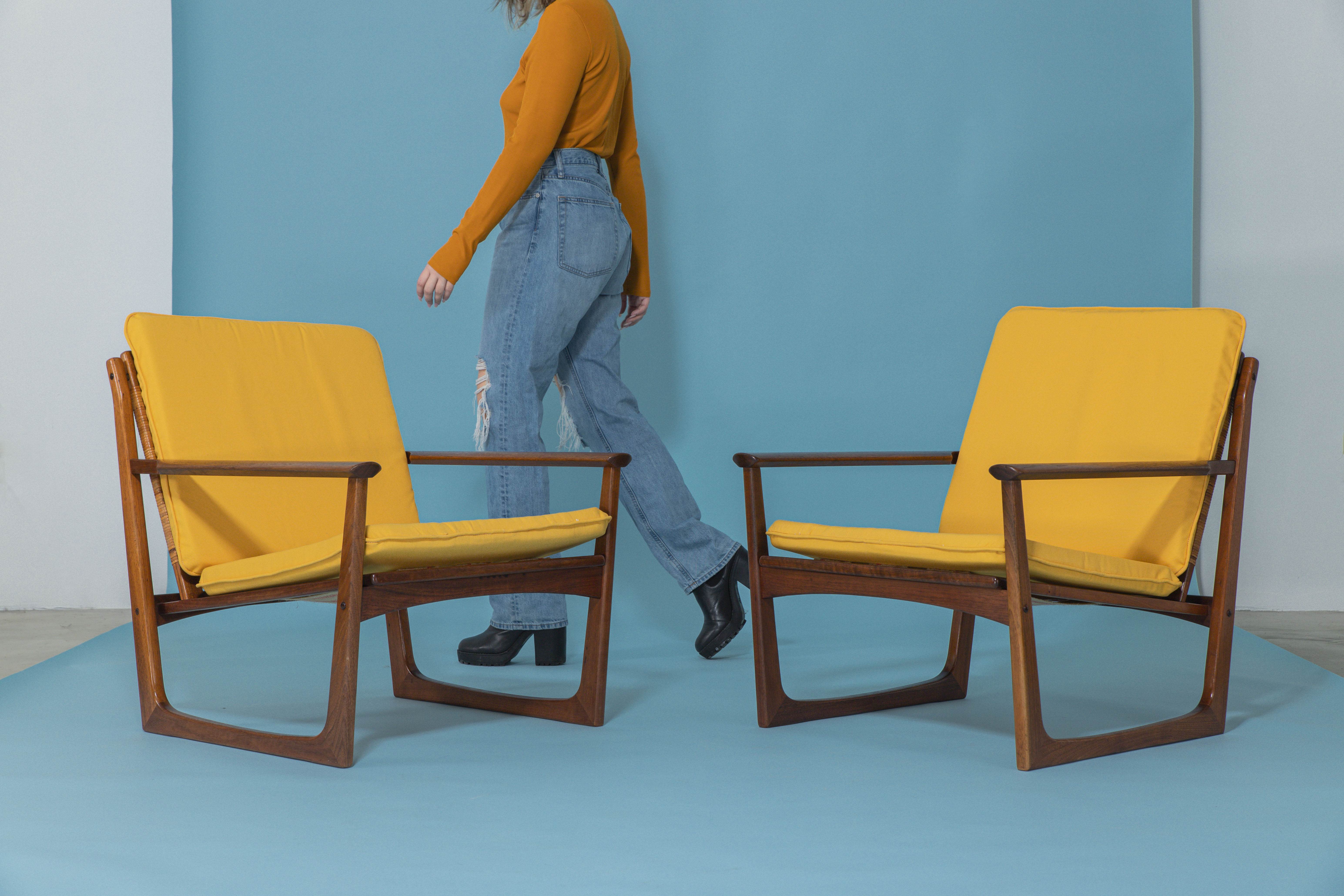 Styled lifestyle photoshoot with mid-century chairs in studio setting
