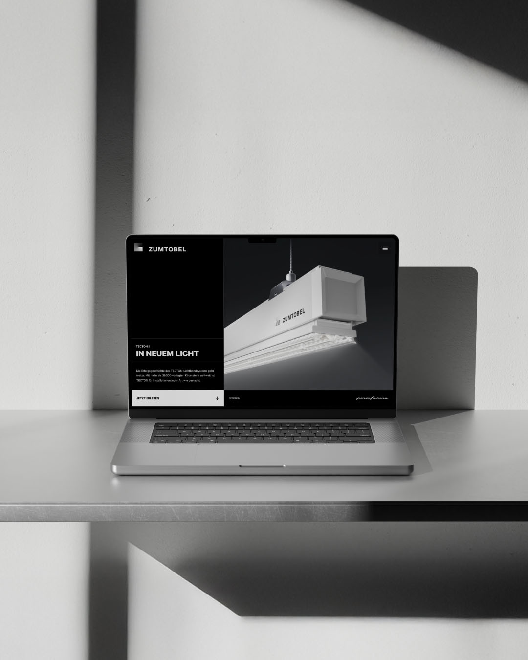 Laptop with the Zumtobel TECTON II landing page as a preview view, created by Webflow Premium Partner Achtzehn Grad, with a focus on the light line system.