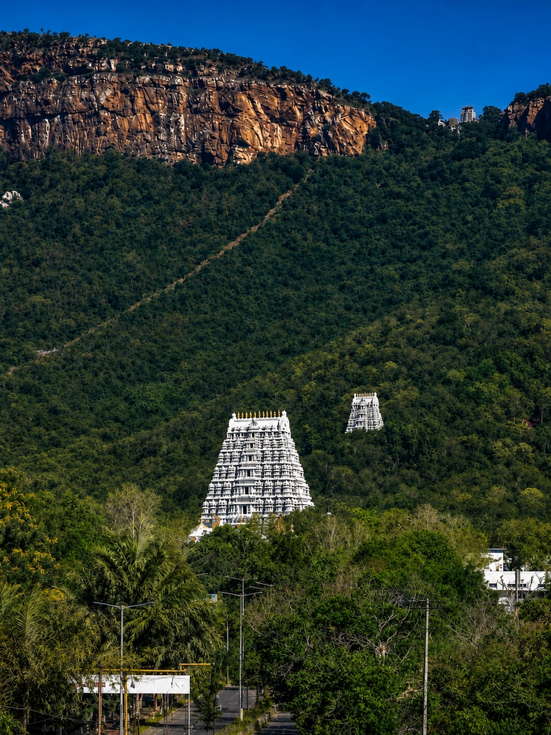 Garudadri hill of the Sapta Giri range with temple towers nestled at its base