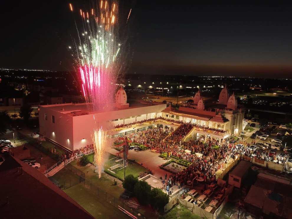 An aerial view of the temple courtyard and community gathering during the 2025 celebration.