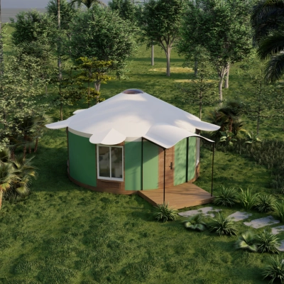 Green yurt with white roof nestled in lush forest landscape