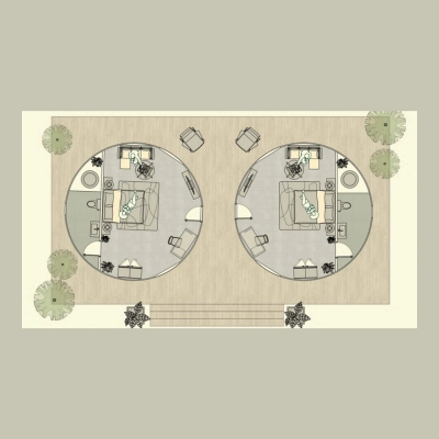 Architectural floor plan with two circular rooms and landscaped exterior