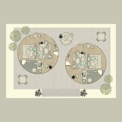 Architectural floor plan showing two circular living spaces with furniture layout