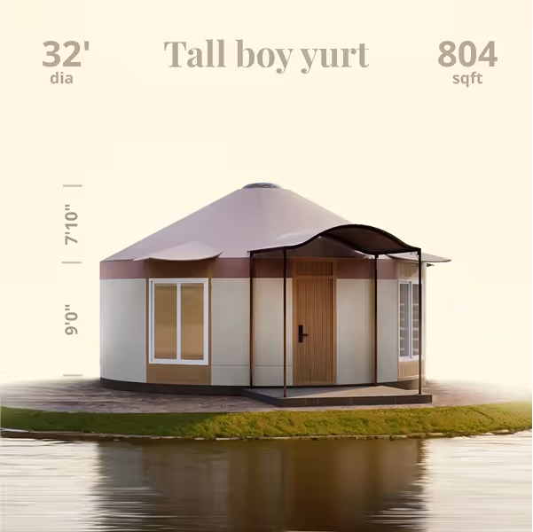 Modern circular yurt with white walls situated by water's edge