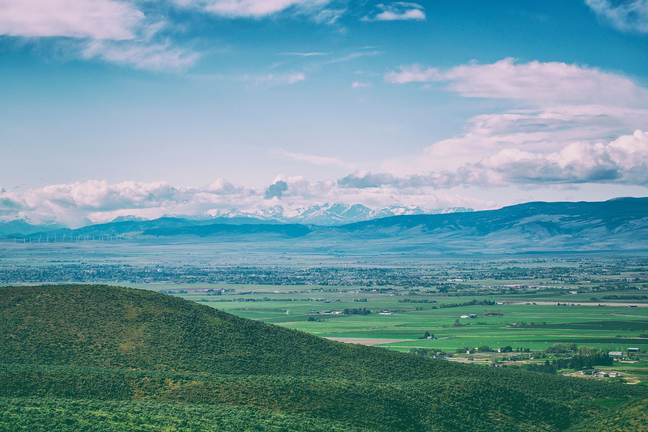 Beautiful panoramic view of Yakima Valley with rolling green hills and the valley of homes and businesses