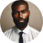 A man with a beard wearing a white shirt and tie.