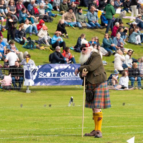 Judge observing athlete during weight for height competition at Crieff Highland Games