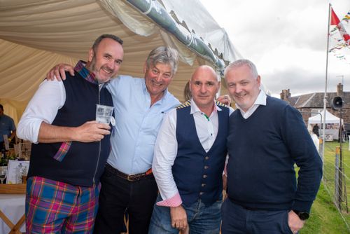 visitors taking group photo for memory