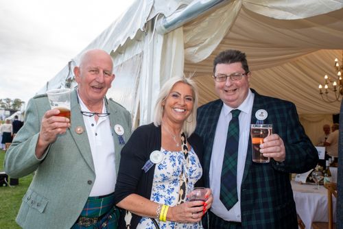Visitors enjoying drinks at event