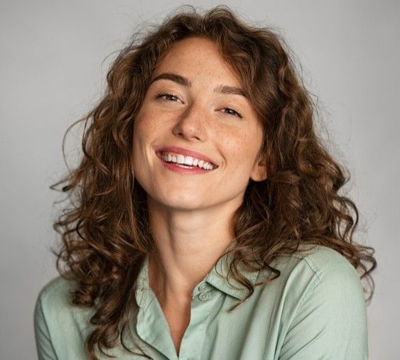 smiling patient at dentist Mandurah showing healthy teeth