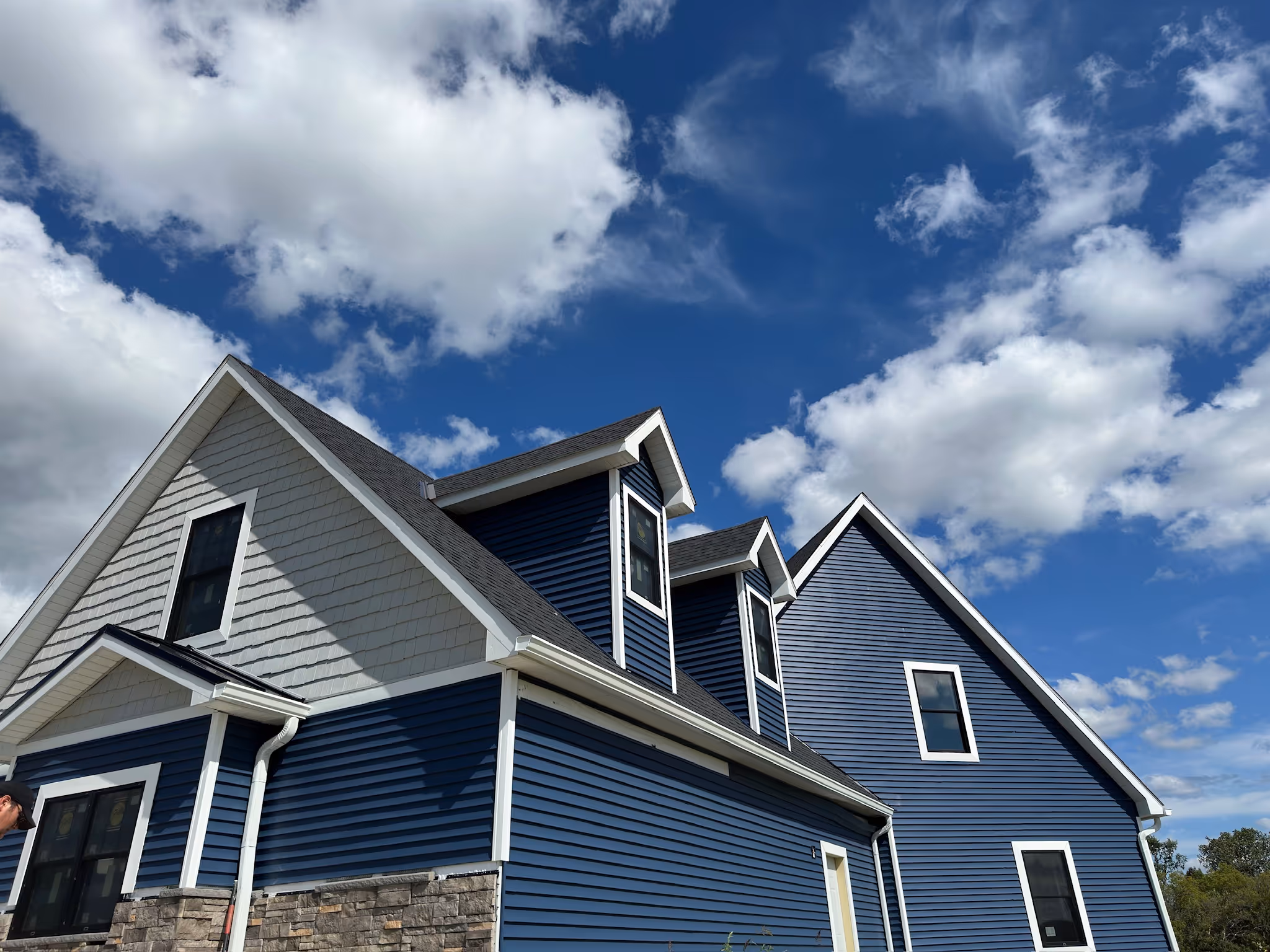 Homeowner in Michigan with a Asphalt Roof Installed by Homezone
