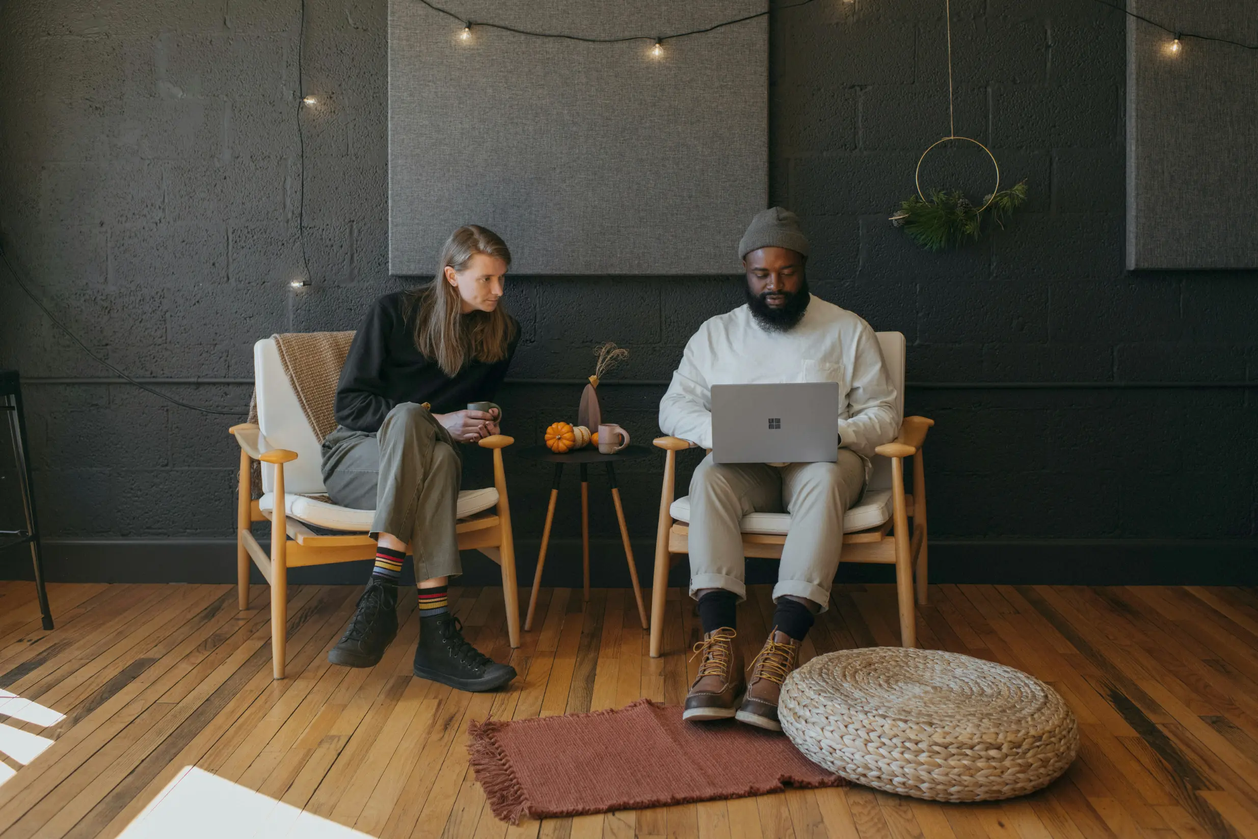 First-time buyers discussing mortgage options in London with a broker.