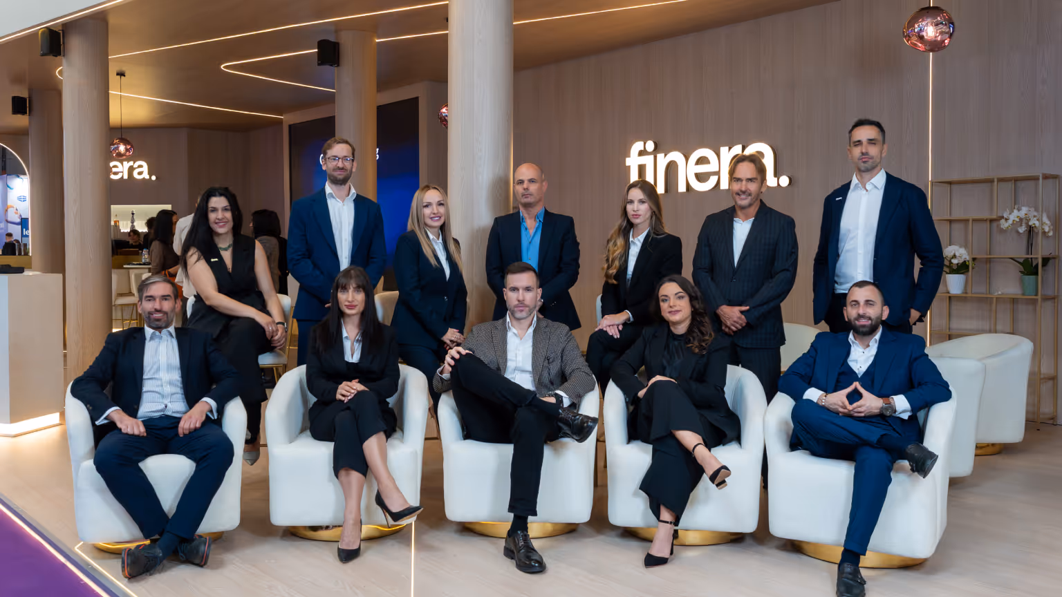 Group photo of the finera. team standing at Booth 6024 during SiGMA Central Europe 2025 in Rome.