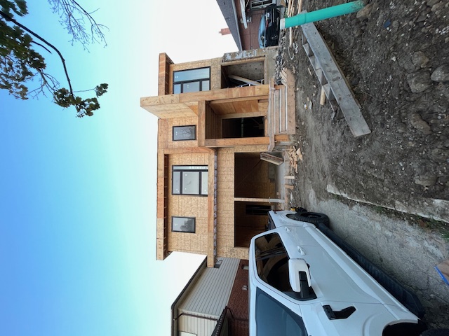 Completed custom home with windows installed by Mar Framing in Toronto, Ontario