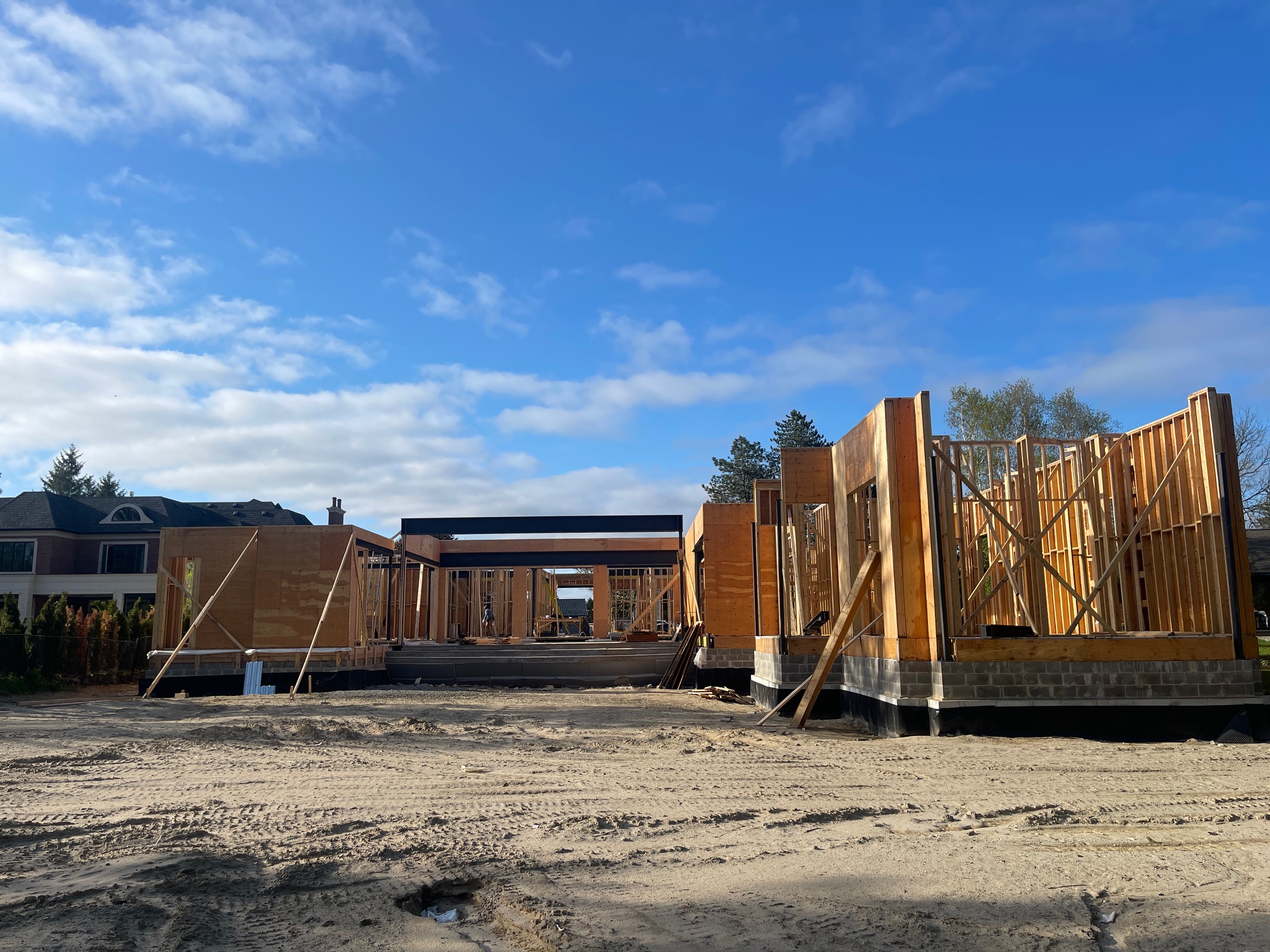 Wall framing underway at the back of a residential project in Vaughan, Ontario by Mar Framing
