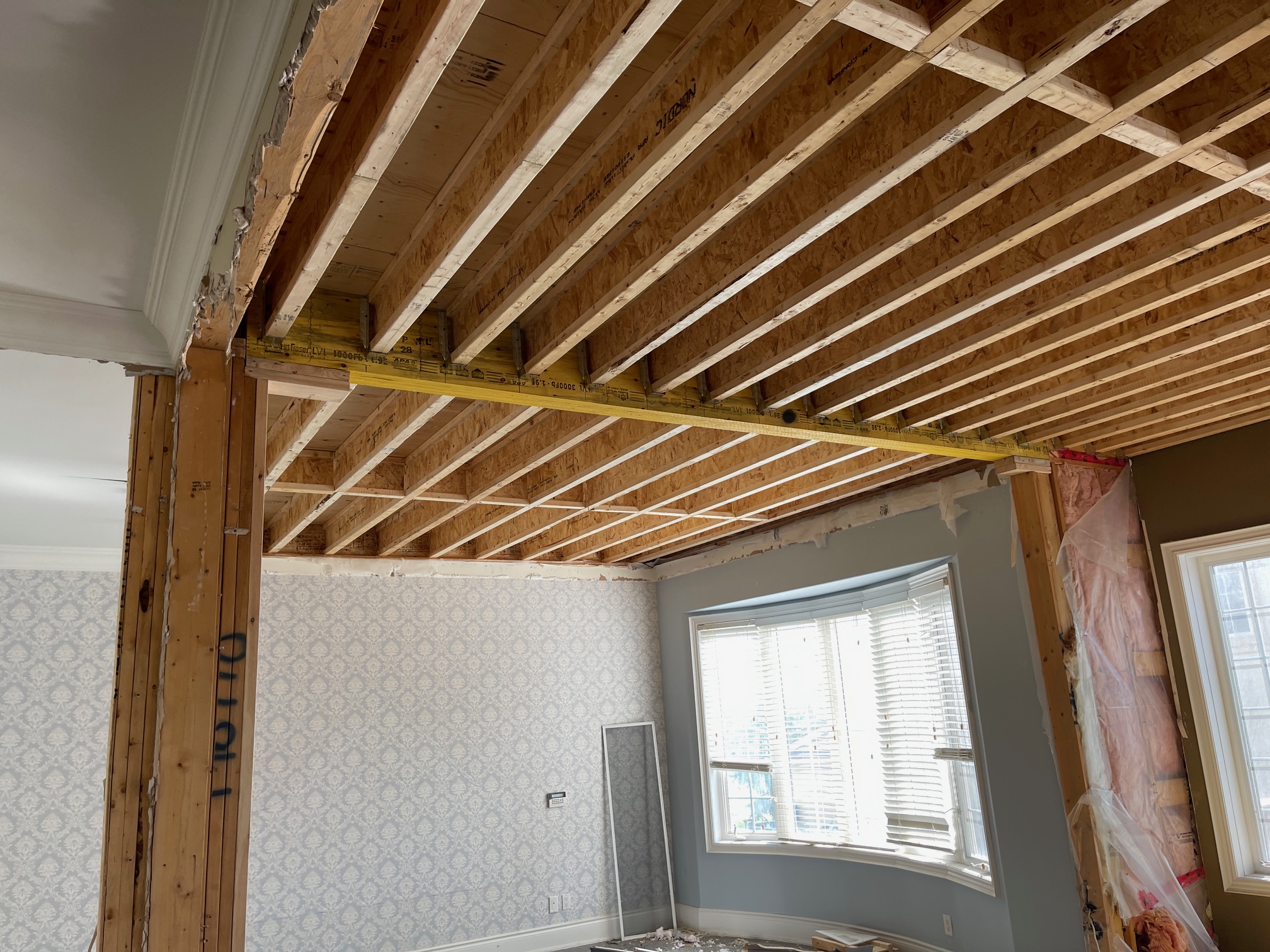 Two LVL beams installed after load bearing wall removal in Richmond Hill, Ontario home renovation