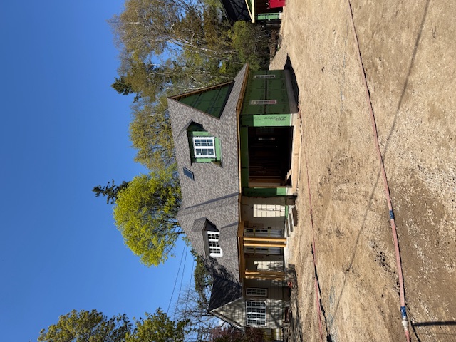 Heritage home with hand-framed roof and steel beam addition in Oakville, ON