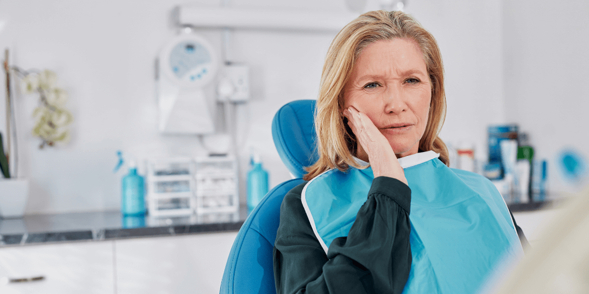 Patient receiving urgent care during dental emergency