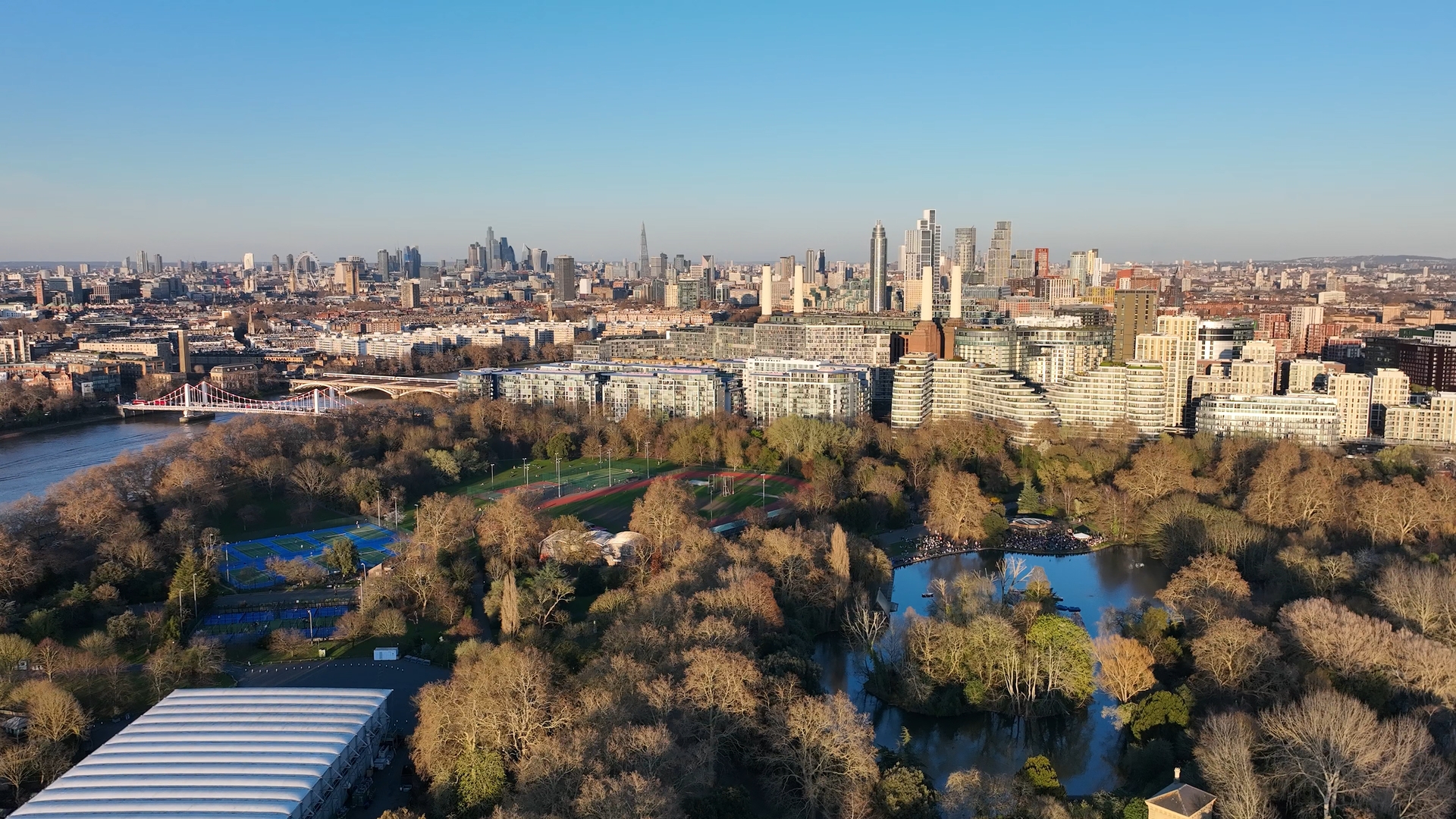 Aerial drone view of Battersea Park and central London skyline
