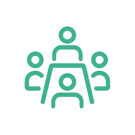 Icono de cuatro personas reunidas alrededor de una mesa, simbolizando una sala de reuniones.
