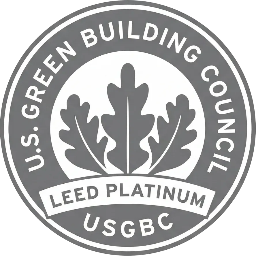 Sello circular del Consejo de Construcción Verde de EE. UU. con tres hojas de roble y la etiqueta LEED Platinum.