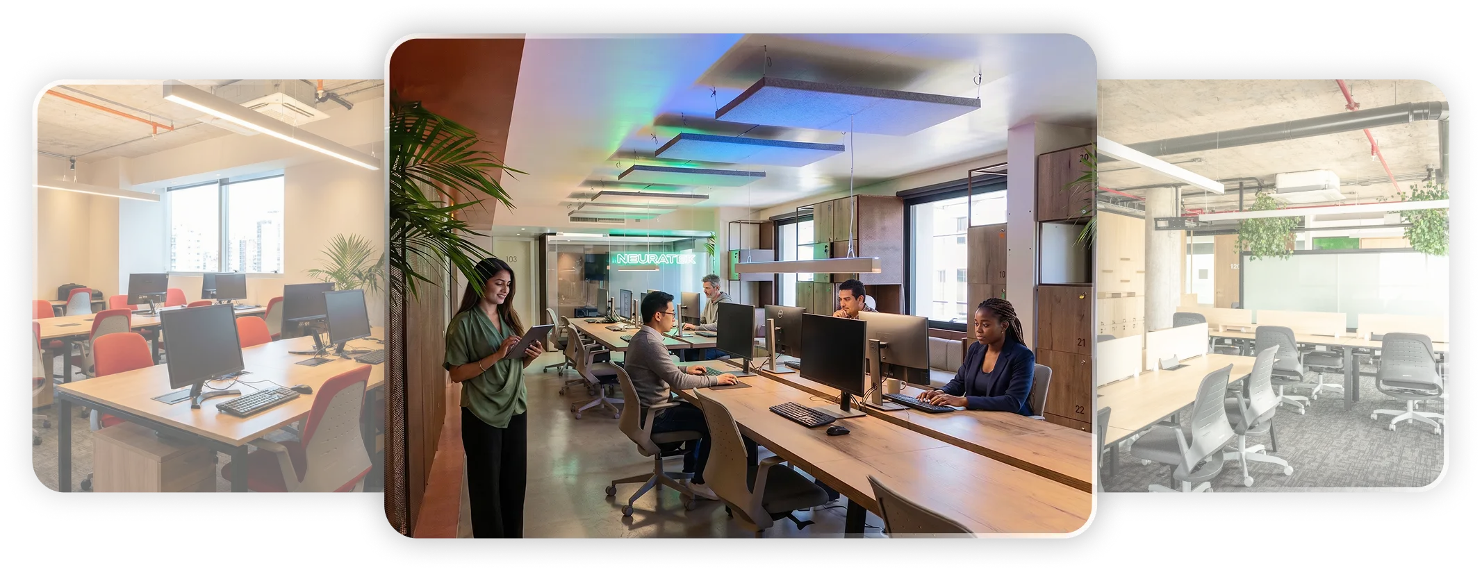 Oficina moderna con ventanales grandes, escritorios abiertos, plantas y vista urbana al atardecer.