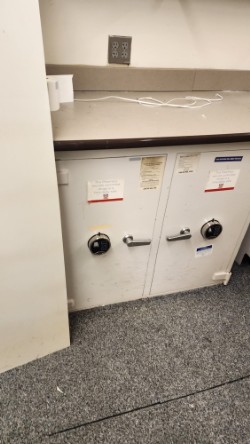 Cream-colored double door pharmacy safe from Rite Aid, secure drug storage safe for pharmacies and medical facilities.