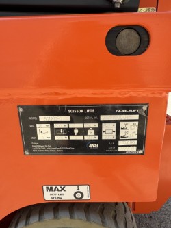 Noblelift SC1930EC scissor lift specification badge showing model details, load capacity, and safety information