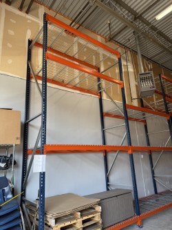 Practically new used pallet rack system with adjustable teardrop uprights and beams for warehouse storage