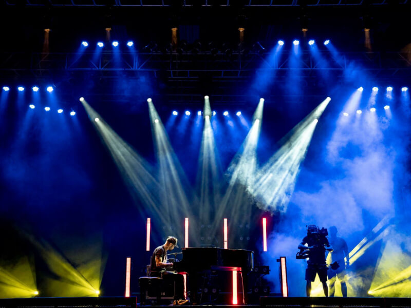 Professional lighting design and grand piano performance at Juneteenth 2022 — creative event production DC