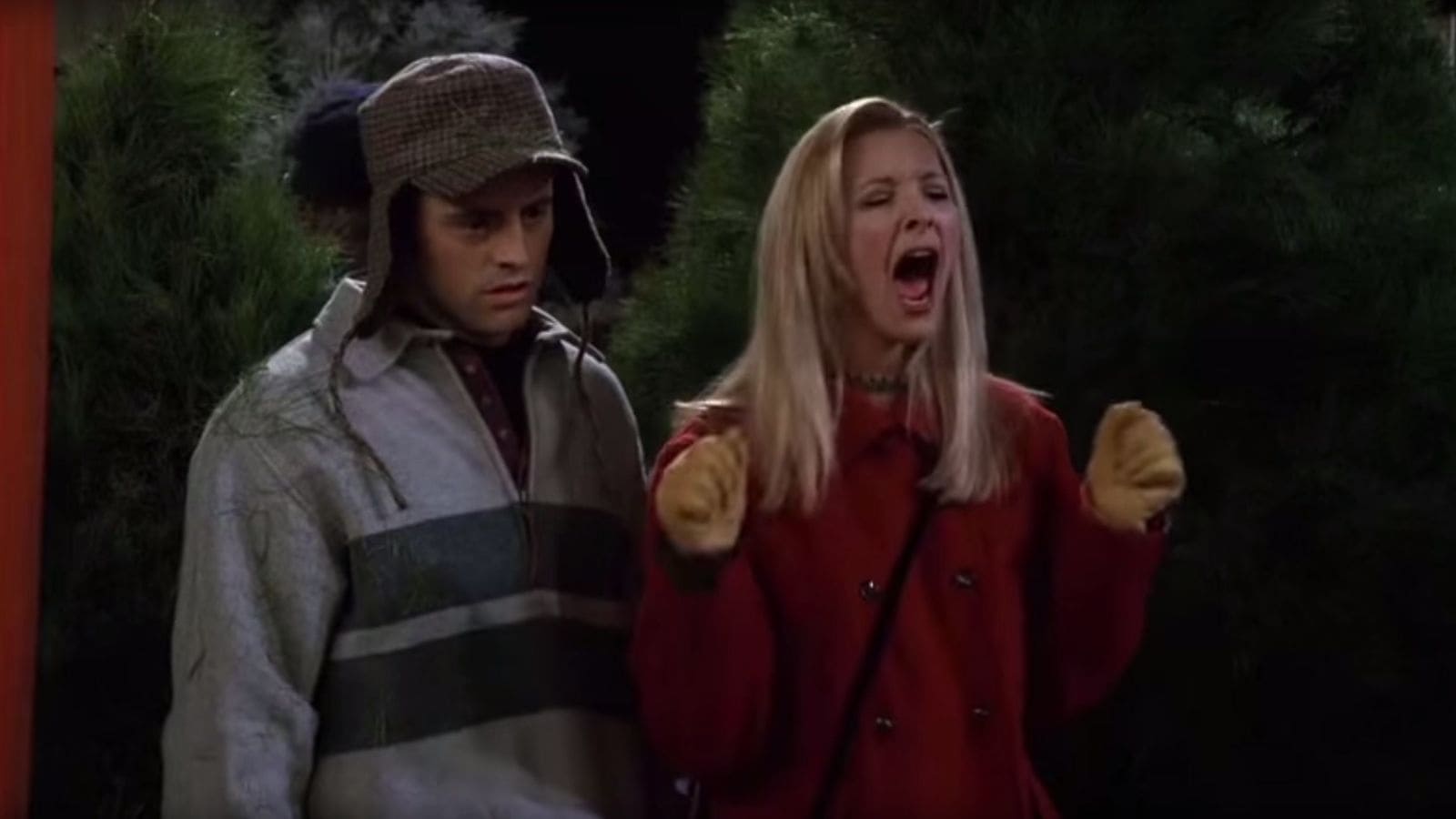 Phoebe yelling whilst standing next to Joey from friends