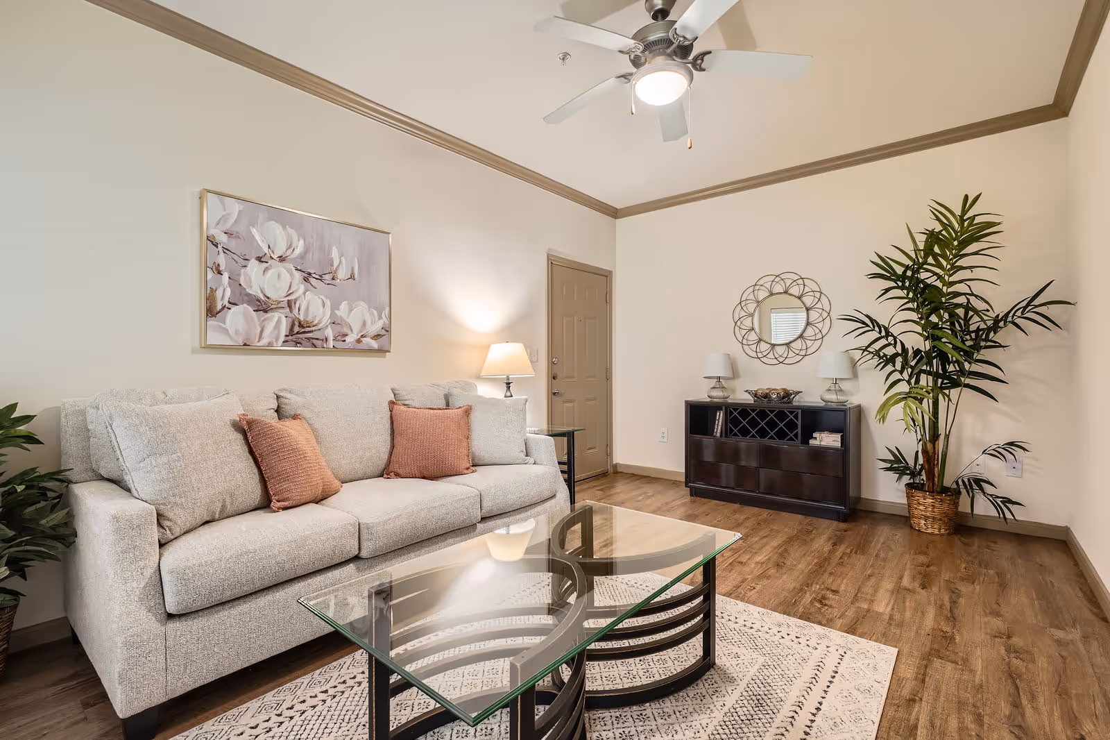 Living room with large plant in corner