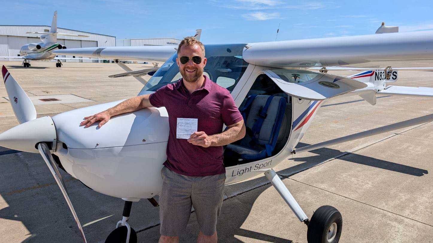 man next to plane