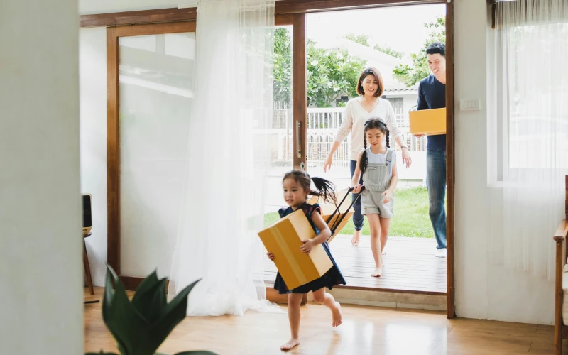A young family entering their first home, which was purchased using a Virginia Housing Second Mortgage.