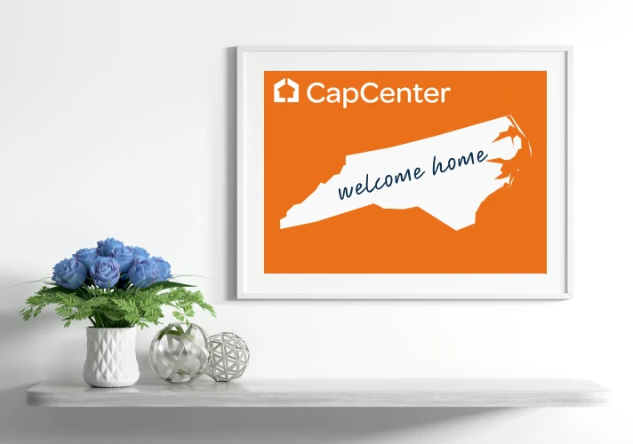 The interior of a home showing a picture of the state of North Carolina, where CapCenter is a top-rate mortgage lender.