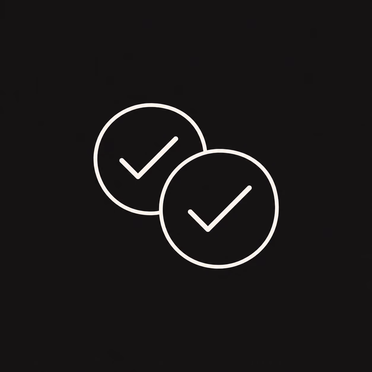 Two overlapping circles each containing a checkmark symbol on a black background.
